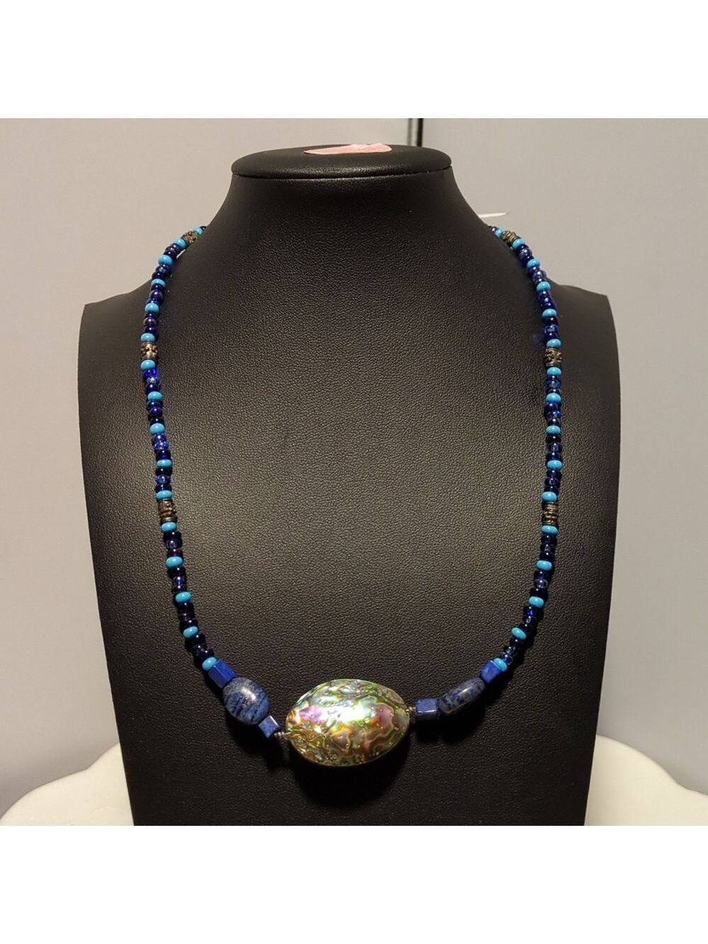 Indigenous Made Abalon Shell Pendant With Blue Beads.